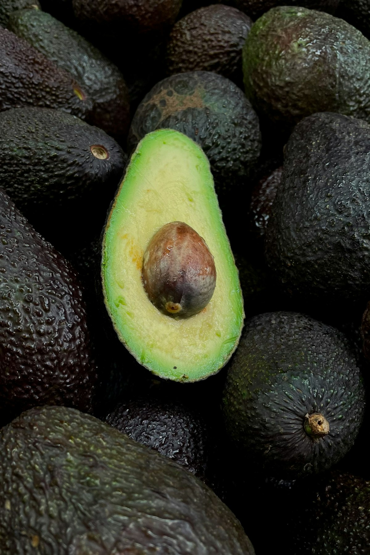 Assorted whole avocados