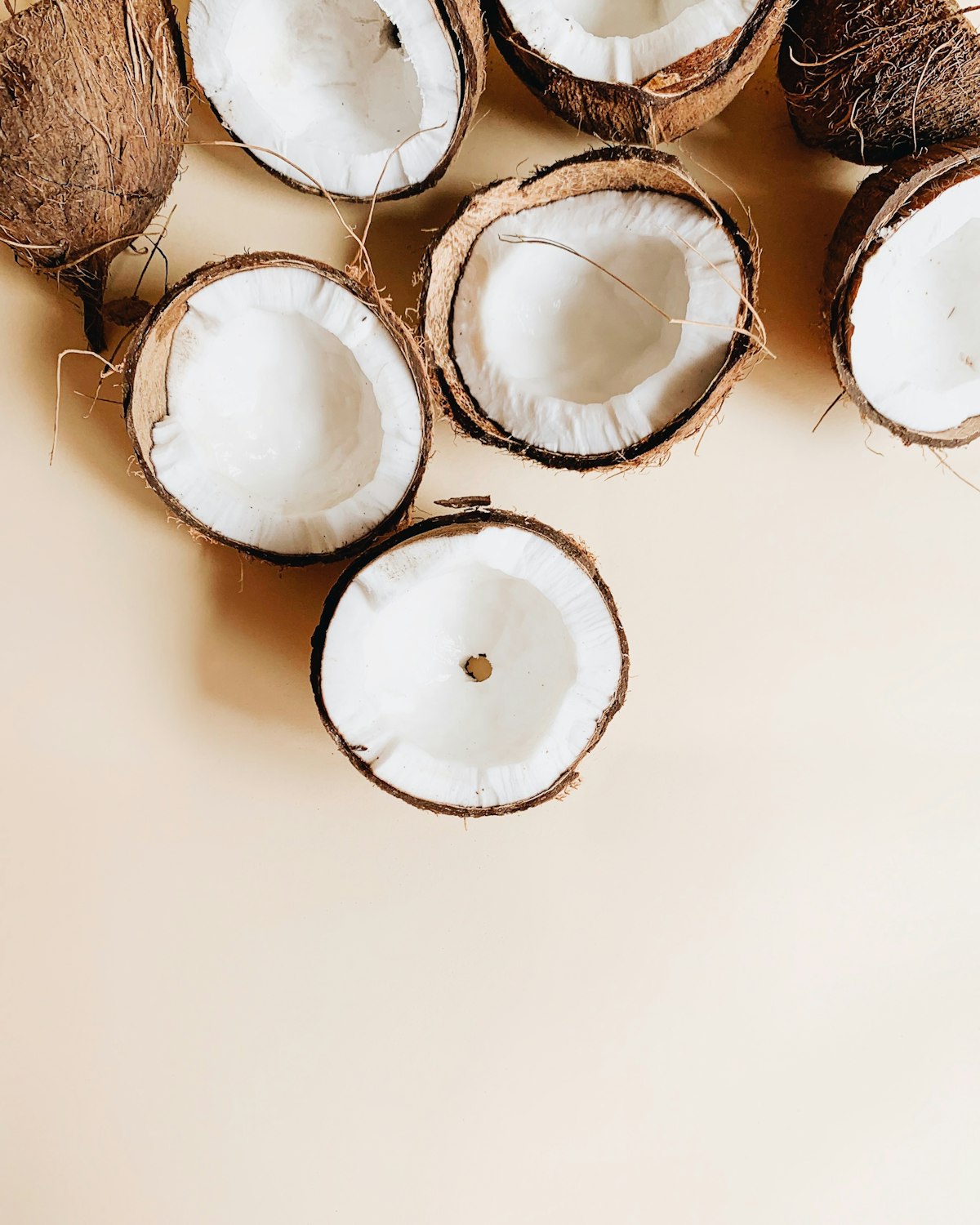 Whole dry brown coconuts